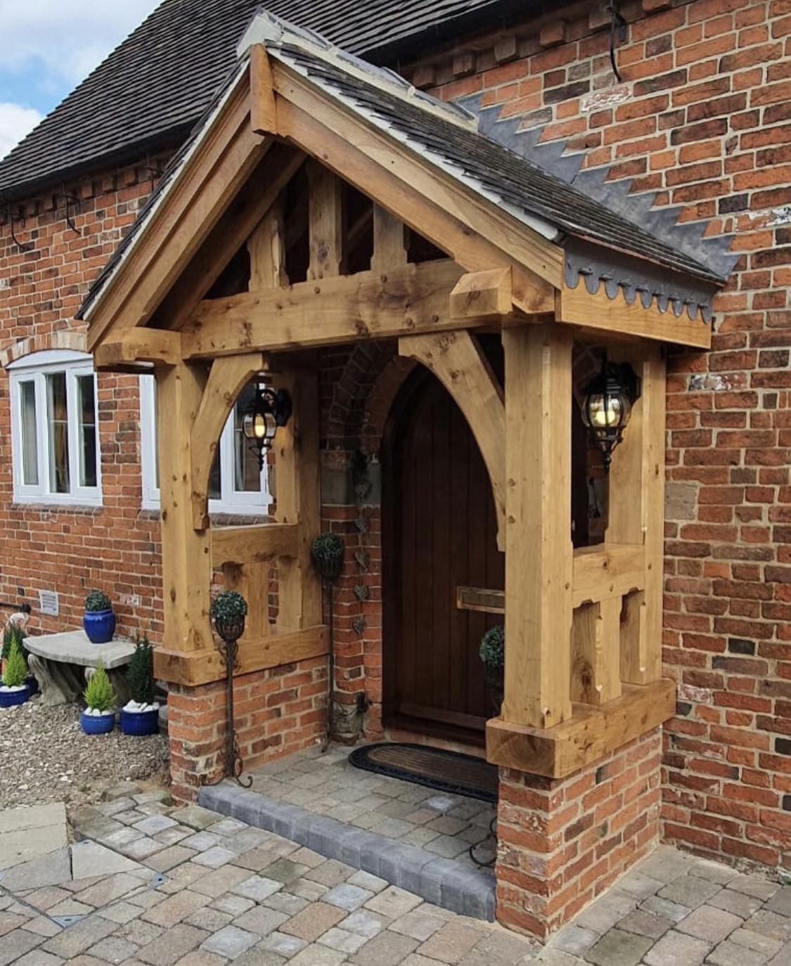 Curved oak braces and tiled roof